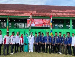 Kurnaidi Kepala Desa Pagar Bulan Bertindak Sebagai Inspektur Upacara Bendera HUT RI Ke-80