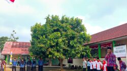Sekretaris Desa Pagar Bulan Agung Pranata,S.E Bertindak Sebagai Inspektur Upacara Bendera HUT ke-81 RI 